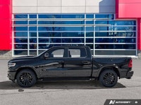 This Ram 1500 has a dependable Twin Turbo Premium Unleaded I-6 3.0 L/183 engine powering this Automa... (image 1)