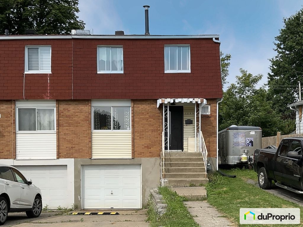 $500,000 - Townhouse for sale in Longueuil (Greenfield Park) — photo 1