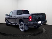 This Ram 2500 delivers a ESL 6.4L V8 HEMI(R) HD engine engine powering this Automatic transmission.... (image 3)