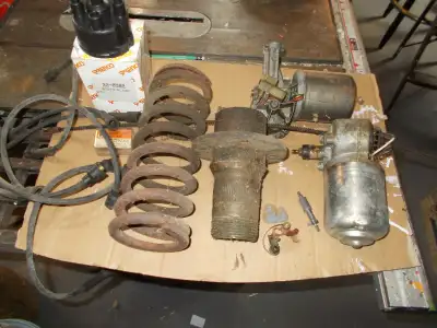 I have several parts for a 1971 MGB. There is a Distributer cover, a wheel hub, a spring, some other...