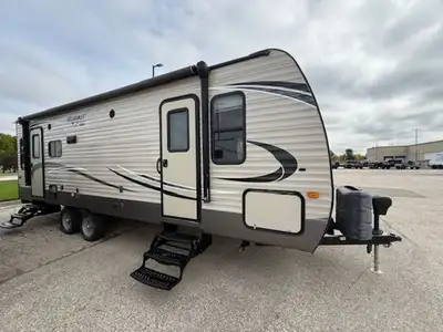 Just arrived! This couples trailer has a spacious living area designed for company. The front bedroo...