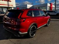 Welcome to Cumberland Honda 2026 Honda CR-V Hybrid Touring Radiant Red Metallic AWD CVT 2.0L 16V DOH... (image 6)