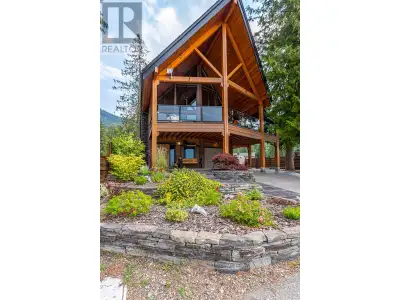 Waterfront Gated Community! Located in the exclusive Mountain Shore community, this custom-built hom...