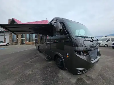 Coachmen Euro Class A gas motorhome 25TB highlights: Spacious Full Bath Induction Cooktop Recliners/...