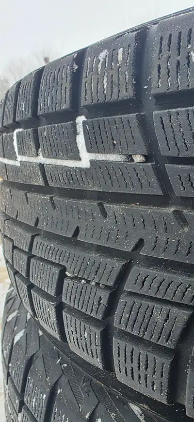 Yokohama Ice Guard Winter Tires on Steel Rims with hub caps. 205/65R16 5x114.3 bolt pattern metric 5...