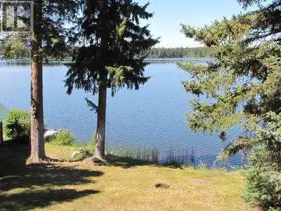 Beautiful lake shore property on one of the most gorgeous lakes in the Chilcotin area. 2 bedrooms an...