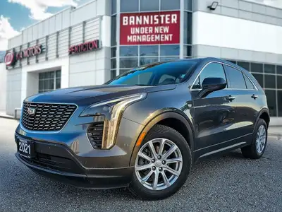 Experience driving sophistication with this 2021 Cadillac XT4 AWD Luxury, presented in a stunning Gr...