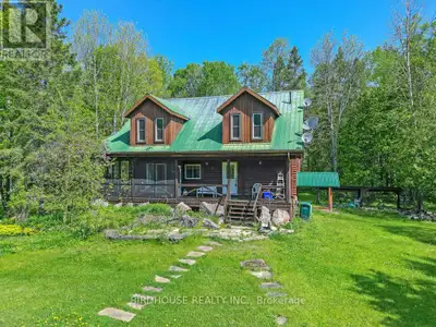 Welcome to your dream log home retreat on 78 acres of land near Seabright, Ontario! This stunning 3...
