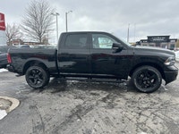 This striking 2023 Ram 1500 Classic SLT Crew Cab Pickup in Diamond Black Crystal Pearl with a Diesel... (image 3)