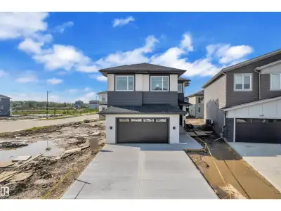 Stunning double car garage detached home LOADED with UPGRADES. Main kitchen with tons of cabinetry,...