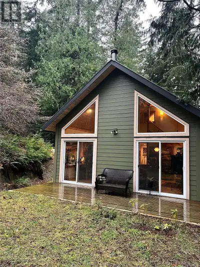 This half interest in a 1 acre lot features a new and thoughtfully designed custom built home, which...