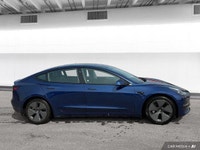 The 2021 Tesla Model 3 offers LED auto-leveling headlights, a panoramic sunroof, and aluminum wheels... (image 5)