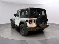 Presenting the 2026 Jeep Wrangler Sport in a classic white finish, this Sport 2 Door 4x4 stands out... (image 2)