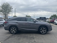 Command sophisticated comfort for every journey in the spacious 2019 Lexus RX 350L, gleaming in an e... (image 3)