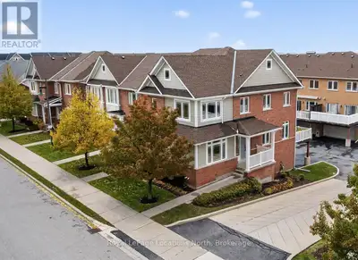 Welcome to 31 N. Maple Street, an elegantly finished end unit townhouse condo that lives and feels m...