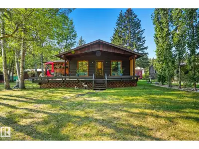 For those who want a large lot, treed large acreage feel--without the hassle of large acreage upkeep...