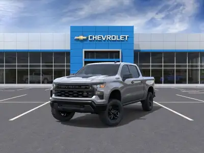 Introducing the 2026 Chevrolet Silverado 1500 Custom Trail Boss, a stately gray machine built to con...