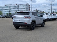 The 2026 Jeep Compass North in Silver Zynith Metallic with a Black interior offers a perfect blend o... (image 6)