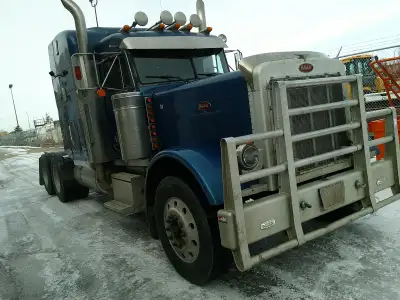 CAT C15 500HP, 18 spd, 40,000 lb rears w/3 way lockers. HERD moose bumper. 11R24.5 on alum whls. MID...