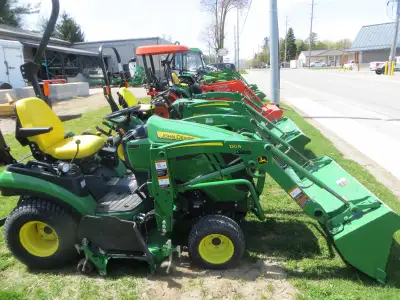 loader and mower; only 415 hours; like new; hydrostatic drive; mid and rear PTO; 3 pth; 4x4; diesel;...
