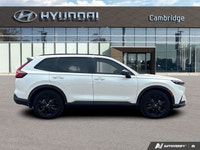 The 2026 Honda CR-V Hybrid Touring isn't just an SUV; it's your efficient and sophisticated partner... (image 5)