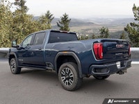 Command every challenge with this powerful 2022 GMC Sierra 3500HD AT4 Crew Cab Pickup. Dressed in st... (image 2)