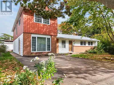 Offering five bedrooms, two full bathrooms, and plenty of potential, this two-storey home is an exce...