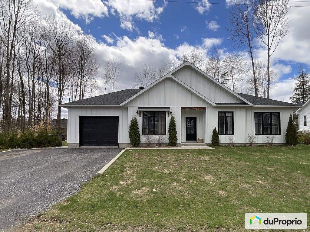 $619,000 - Bungalow for sale in St-Ambroise-De-Kildare — photo 1