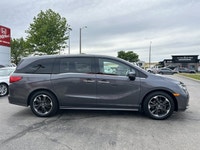 Engineered for memorable family journeys, this 2024 Honda Odyssey Touring in sophisticated Modern St... (image 3)