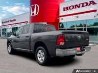 Command the road with this 2022 Ram 1500 Classic SLT Crew Cab, boasting a powerful 3.6L Pentastar VV... (image 3)