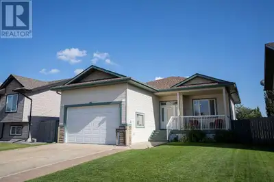 Originally custom-built, this raised bungalow offers warmth, functionality, and thoughtful upgrades...