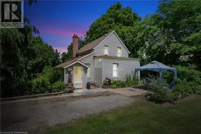 Welcome home to your little piece of paradise! This gorgeous 1-acre property is a perfect hobby farm...