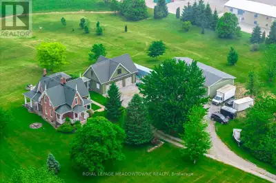 Nestled on a picturesque 46.5-acre property, this breathtaking century home seamlessly blends histor...