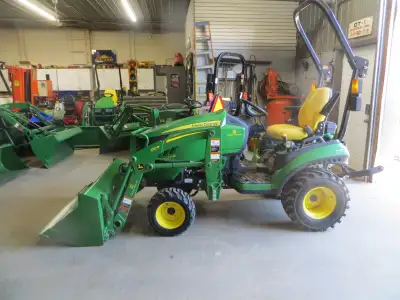 with only 303 hours; like new unit; quick attach bucket and loader; hydrostatic drive; mid and rear...