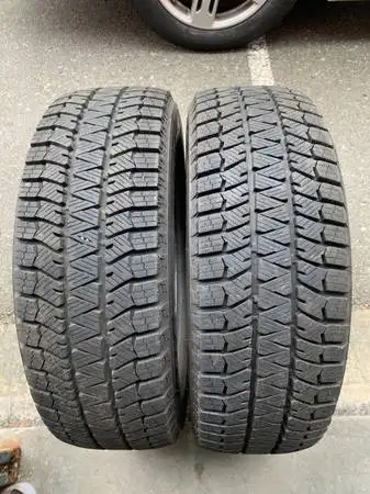 a nice PAIR of Bridgestone Blizzak winter tires both Like New (2 TIRES ONLY) size 225/65/17 102H M S...