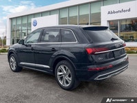 The black 2024 Audi Q7 Komfort, masterfully combines powerful performance with refined luxury. This... (image 2)