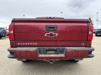 AMVIC Licensed Dealer This 2018 Chevrolet Silverado 1500 2LT is finished in striking Cajun Red Tintc... (image 6)