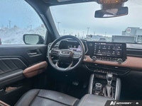 Experience rugged midsize capability and bold styling with the *2023 GMC Canyon AT4*, featuring *82,... (image 9)