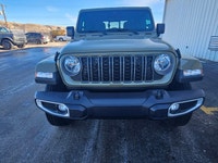 For a quick response please text 403-820-9940. AMVIC licensed business The 2026 Jeep Gladiator Sport... (image 1)
