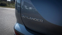 This Mitsubishi Outlander has a strong Regular Unleaded I-4 2.5 L/152 engine powering this Variable... (image 6)