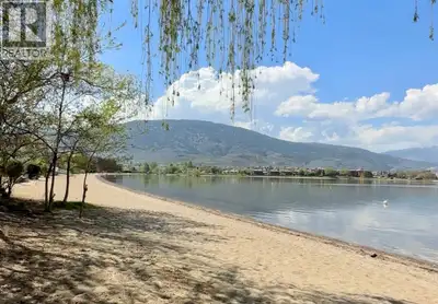 WATERFRONT & SANDY BEACH - EXCEPTIONAL OPPORTUNITY ON OSOYOOS LAKE!!! Whether you are looking to kee...