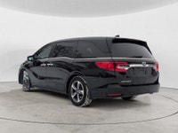 This 2020 Honda Odyssey EX-L finished in a sleek black exterior with a matching black leather interi... (image 2)
