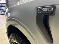 Experience the renowned 2022 Ford F-150 XLT 4x4 SuperCrew in a striking Silver finish, built for bot... (image 1)