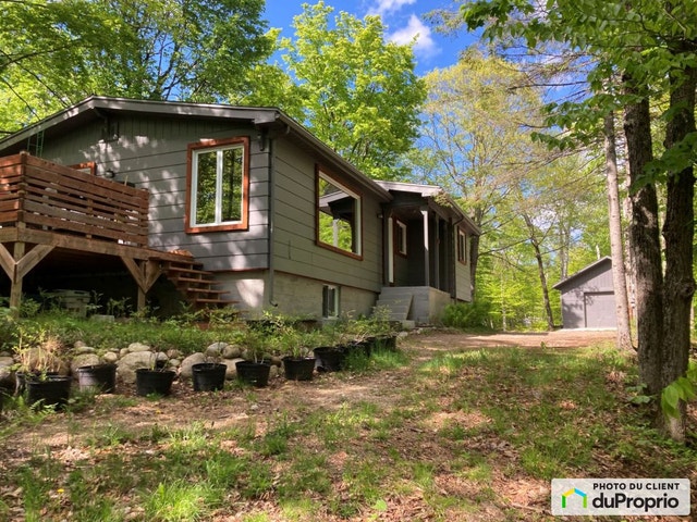 $477,000 - Bungalow for sale in Ste-Adele — photo 1