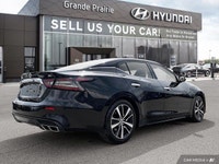 Experience effortless power and sophisticated style behind the wheel of this 2022 Nissan Maxima SL.... (image 5)