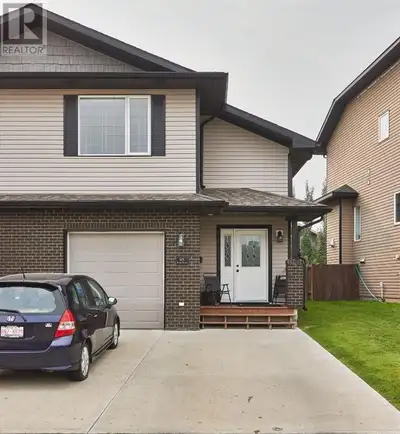 MLS® #A2135003 This spacious half duplex sits in the desirable Hamptons neighbourhood and just steps...