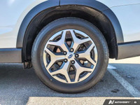The pre-owned *2021 Subaru Forester Touring* is a versatile SUV built for drivers who value safety,... (image 6)