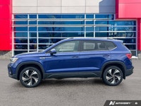 Clean CarFax - Beautiful Blue 2024 Volkswagen Taos Comfortline, 4Motion All-Wheel Drive, 7-Speed Aut... (image 1)