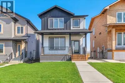 Experience the beauty of this custom-crafted home set in the peaceful surroundings of Crossfield. Th...