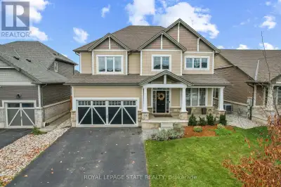 Welcome home to Gateway Avenue in scenic Smithville! This elegant home is perfectly situated on a ha...